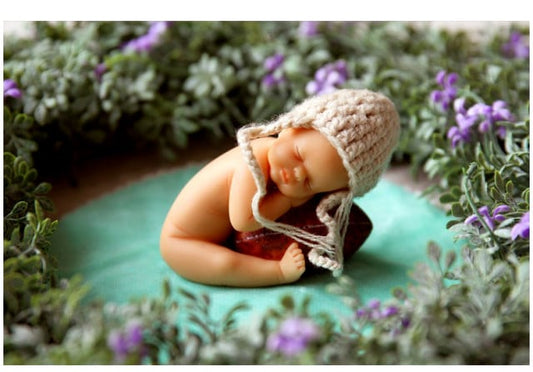 Neonato appoggiato. Stampo in silicone anche per Candele