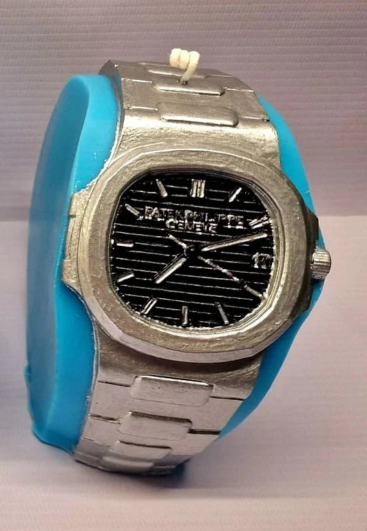 Patek Philippe watch replica in gray and blue, showcasing intricate design and craftsmanship.