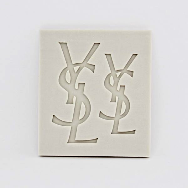 Yves Saint Laurent Griffe. Moda YSL Stampo doppio in silicone