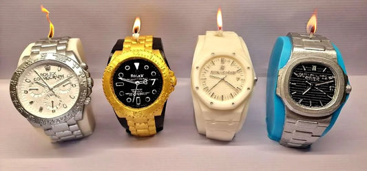 Candele artigianali in forma di orologi di lusso, disponibili in vari colori e stili, made in Italy.
